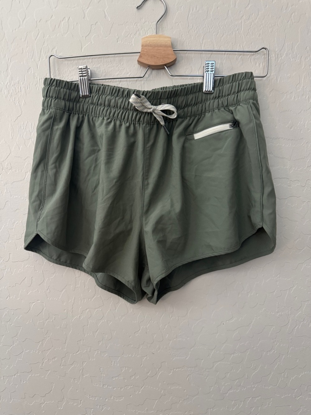 Vuori Olive Green Women's Athletic Shorts with Zip Pocket